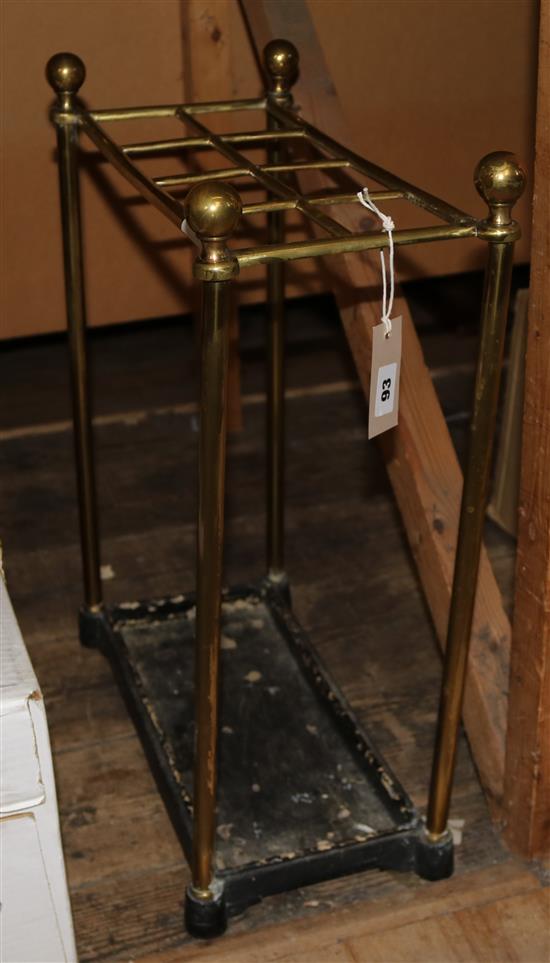 A brass umbrella stand